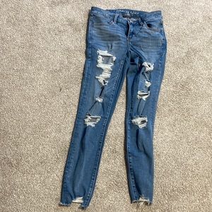 medium wash, distressed american eagle jeans